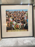 Framed artwork with a collage of people and 'Vintage Blake' branding.